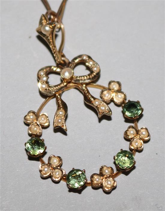 A gold, gem and seed pearl set pendant on a 9ct gold fancy link chain, pendant 1.5in.